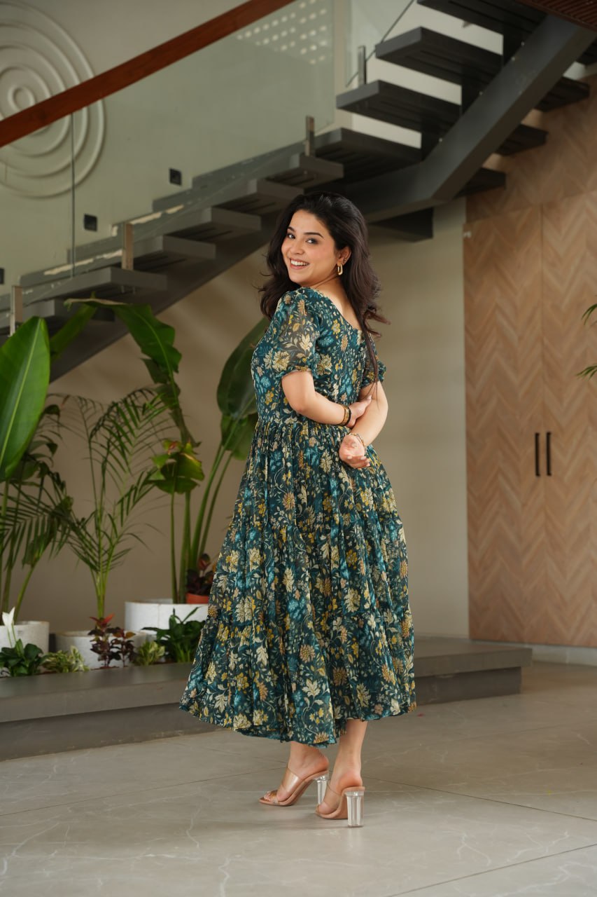 Vikarni Green Printed Anarkali Gown in faux georgette with 12-meter flair – perfect ethnic wear for women, long gown for women, printed gown for girls, Anarkali gown for wedding, georgette gown for festive wear, Indian dress for women, traditional wear for haldi ceremony, party wear gown online, readymade gown under 1000, stylish green ethnic gown for mehndi function.